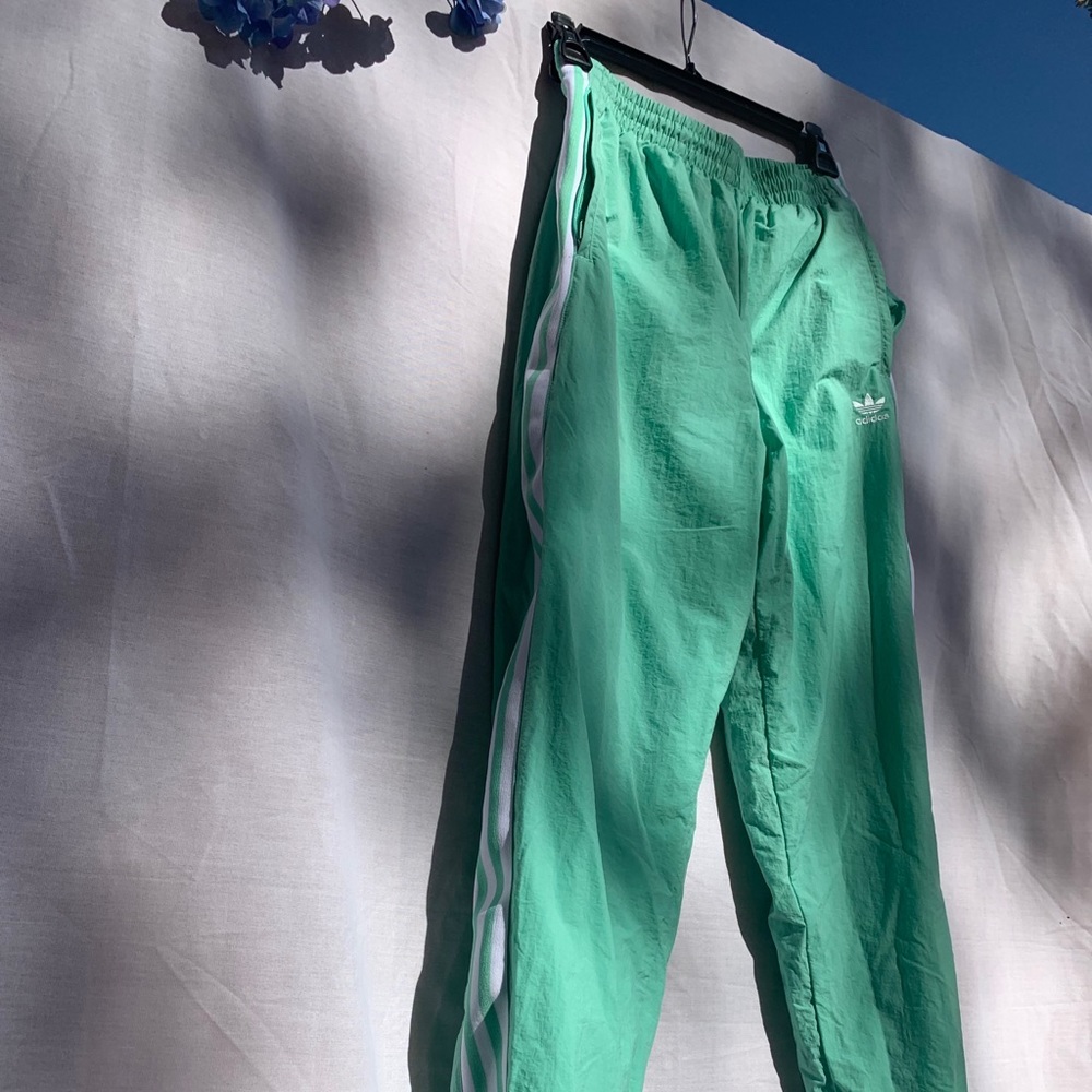 Adidas teal windbreakers size S pants